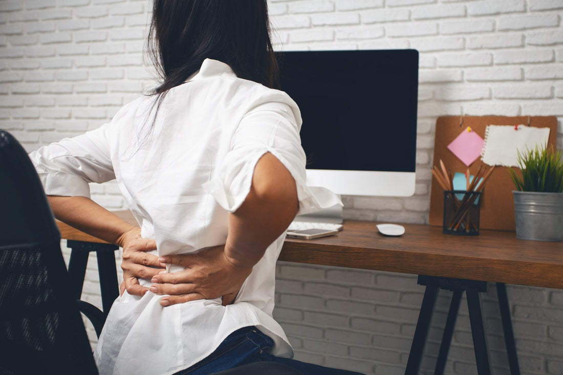 Say Goodbye to Back Pain: How Standing Desks and Ergonomic Chairs Can Help - Home Harmony